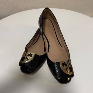 Tory Burch Elegant Black Flats with Gold Detail